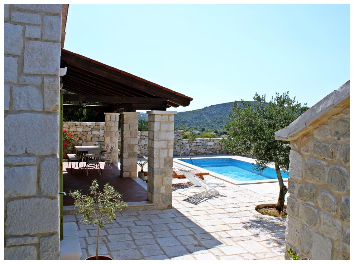 Covered stone terrace at Villa Kate